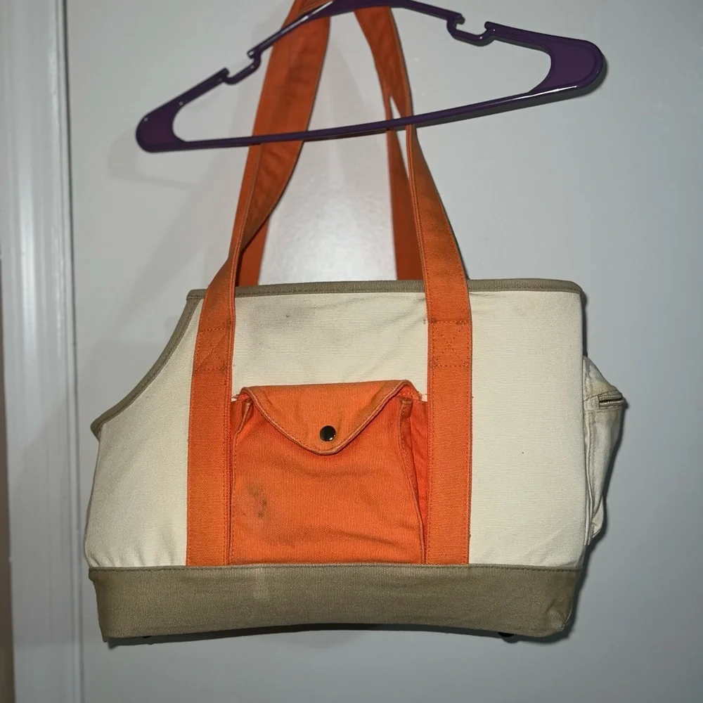 New York dog orange and cream colored dog carrier cold orange small/med